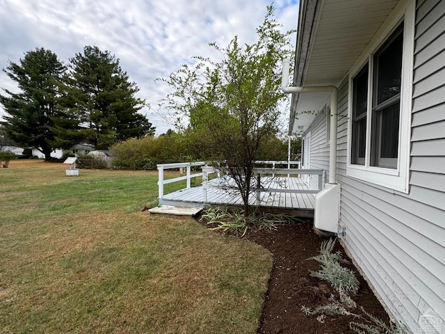 view of yard with a deck