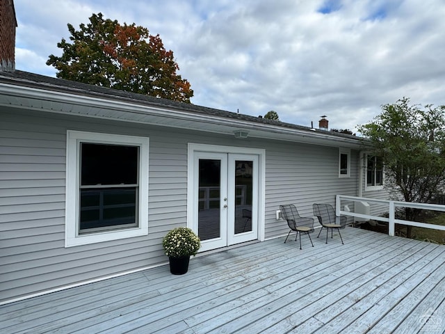 wooden terrace featuring french doors