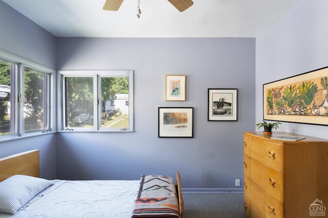 bedroom featuring ceiling fan and carpet flooring