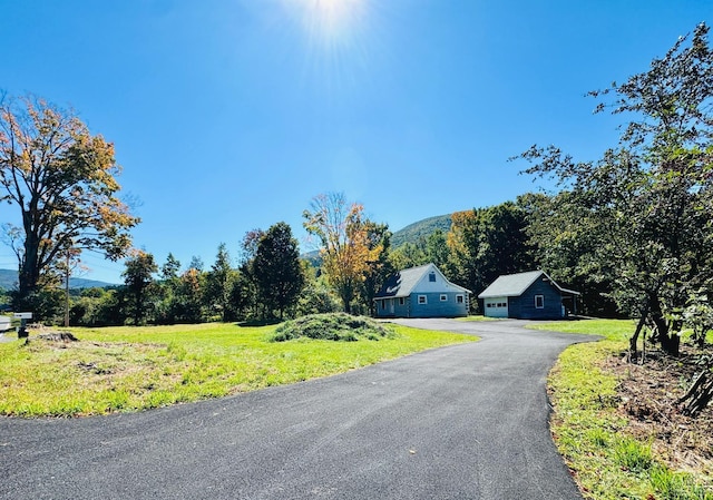 view of street featuring driveway
