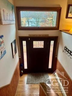 entrance foyer with light hardwood / wood-style floors