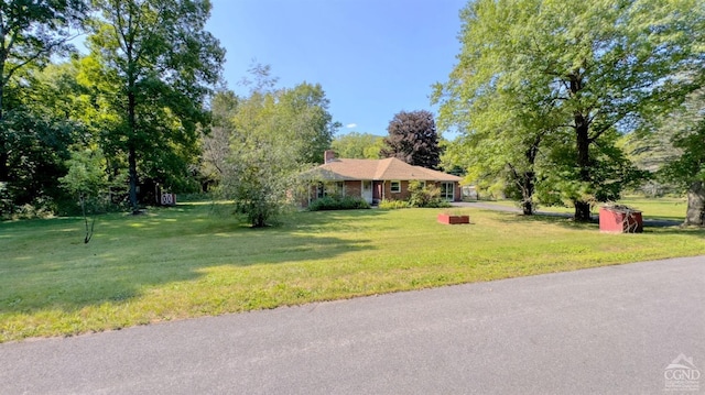 view of front of home with a front yard