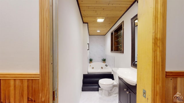 bathroom featuring vanity, toilet, wood ceiling, and a tub