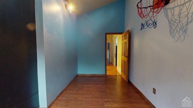 hall with dark hardwood / wood-style flooring