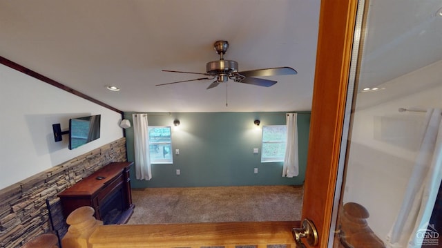 living room with hardwood / wood-style floors, ceiling fan, and ornamental molding