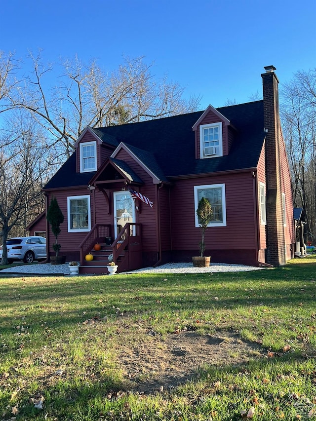 view of front facade featuring a front yard