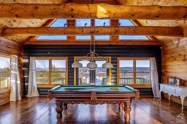 game room with dark hardwood / wood-style floors, lofted ceiling with beams, and pool table