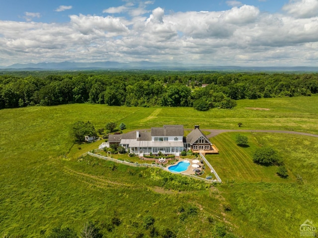 birds eye view of property featuring a rural view