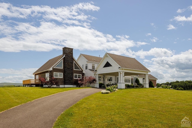 craftsman-style house featuring a porch and a front lawn