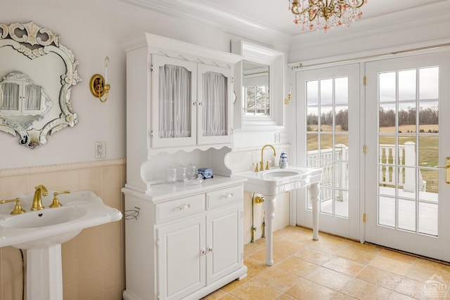 sunroom / solarium with a chandelier