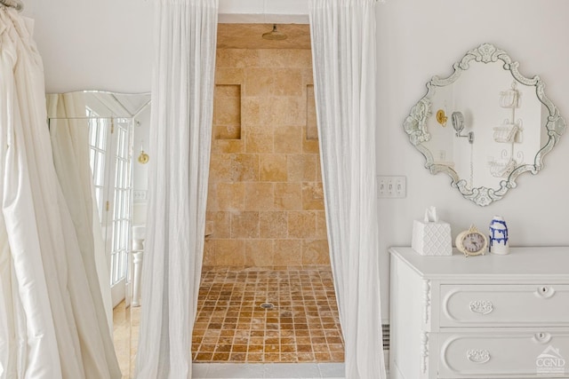 bathroom with a shower with shower curtain