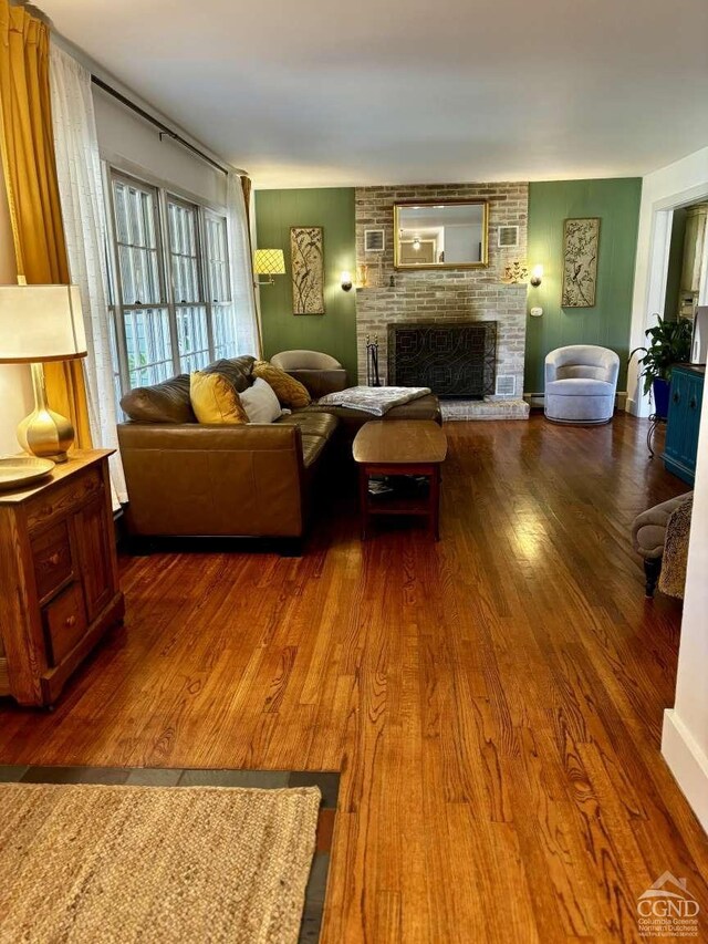 bedroom with dark hardwood / wood-style flooring