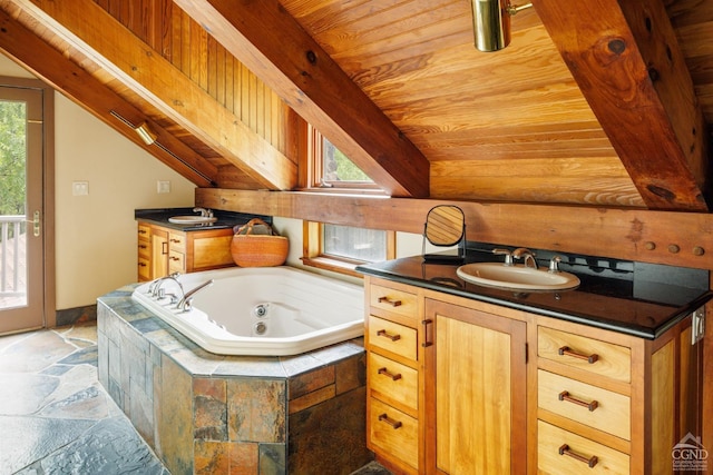 bathroom with vanity, plenty of natural light, and wood ceiling