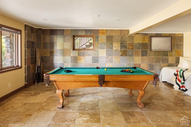 recreation room featuring beamed ceiling, tile walls, and billiards