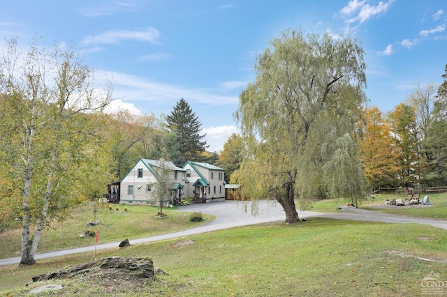 view of front of house with a front lawn