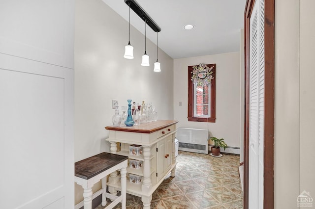 interior space with pendant lighting and butcher block countertops