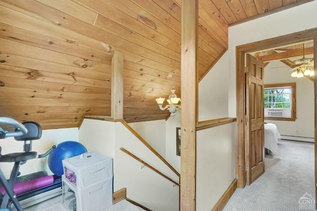 interior space with light colored carpet, a baseboard radiator, wooden ceiling, and lofted ceiling