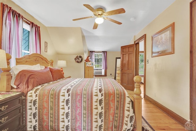 bedroom featuring light hardwood / wood-style floors and ceiling fan