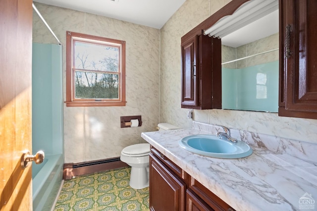 full bathroom featuring bathtub / shower combination, vanity, toilet, and baseboard heating