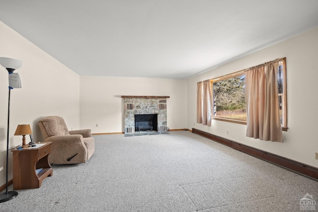 unfurnished living room with carpet and a fireplace