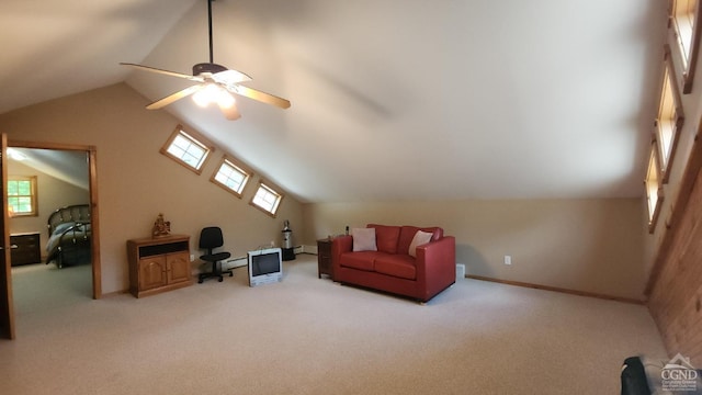 additional living space with ceiling fan, carpet floors, and vaulted ceiling