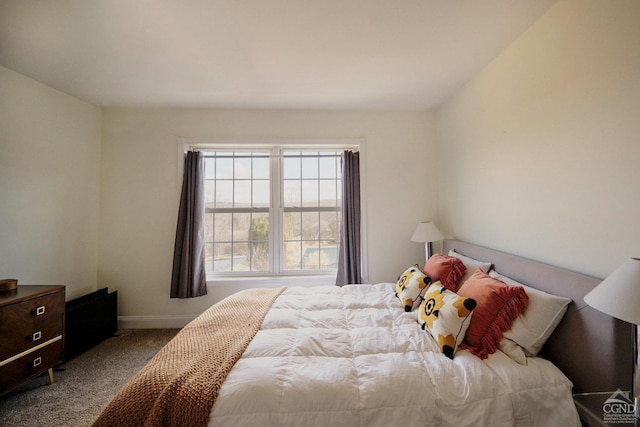 carpeted bedroom with baseboards