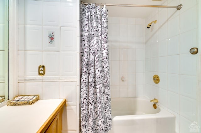 bathroom with shower / bath combination with curtain and vanity