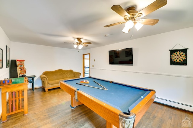 rec room featuring ceiling fan, wood-type flooring, billiards, and a baseboard heating unit