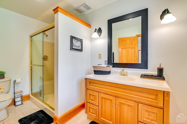 bathroom with walk in shower, tile patterned flooring, vanity, and toilet