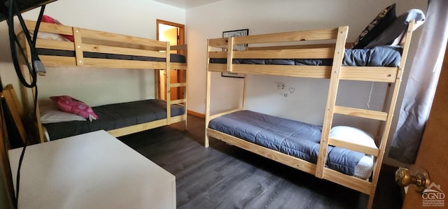 bedroom with wood finished floors