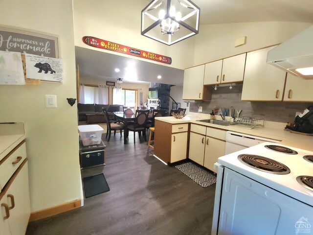 kitchen with ventilation hood, dark wood finished floors, light countertops, white appliances, and a sink