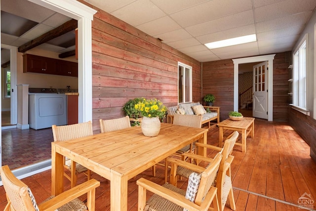 interior space featuring an outdoor living space and independent washer and dryer