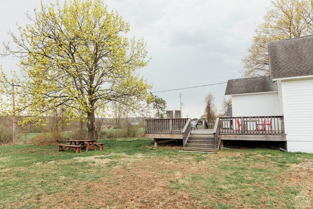 view of yard with a deck