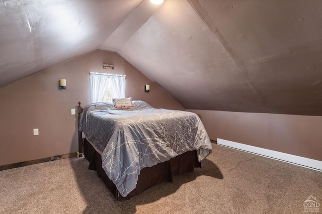 bedroom with lofted ceiling, carpet, and baseboards