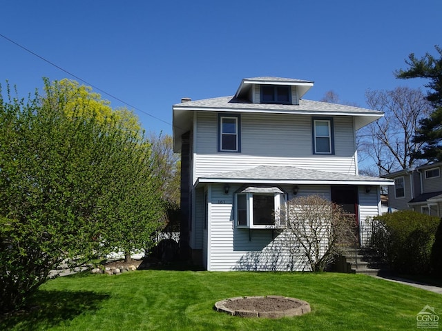 view of front of house featuring a front yard