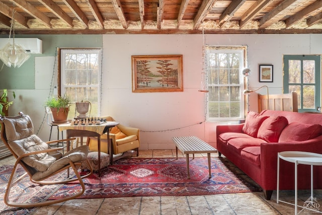 sitting room featuring a wall mounted AC