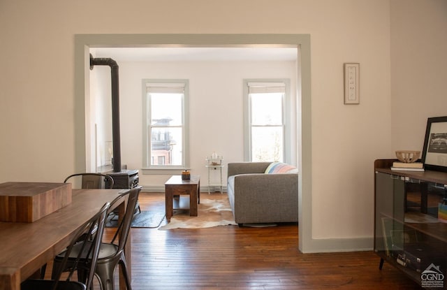 dining area featuring dark hardwood / wood-style floors