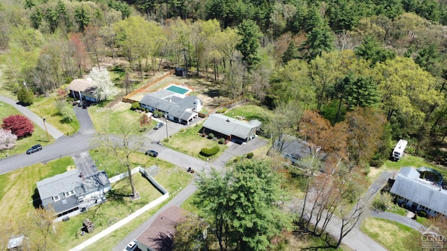 aerial view featuring a view of trees