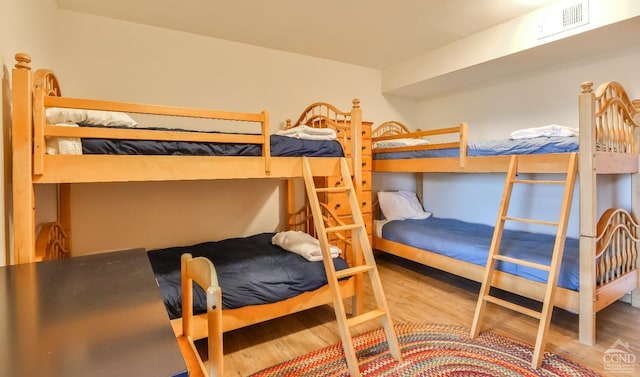 bedroom featuring hardwood / wood-style floors