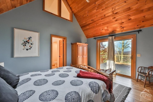 bedroom with wooden ceiling, high vaulted ceiling, ensuite bath, access to exterior, and light hardwood / wood-style floors