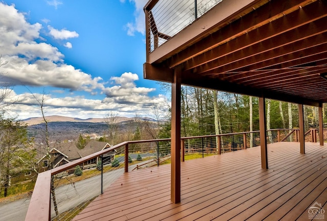 wooden terrace with a mountain view