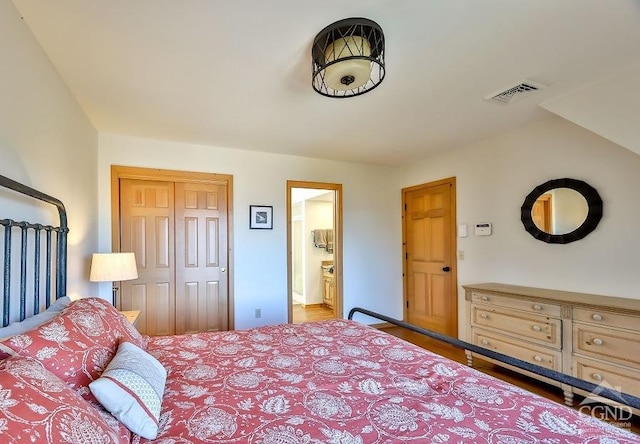 bedroom with wood-type flooring