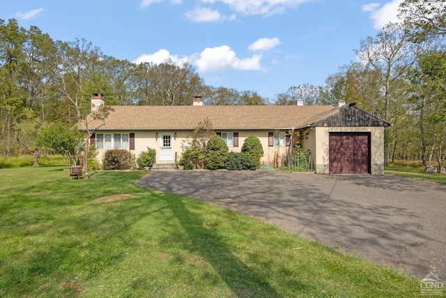 single story home with a garage and a front yard