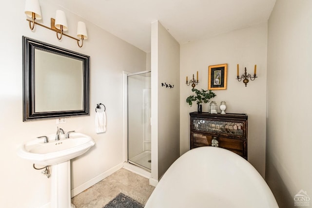 bathroom featuring a shower with door