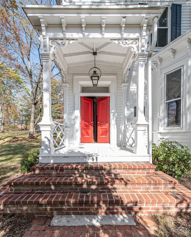 doorway to property with a porch