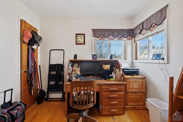 office space with light wood finished floors