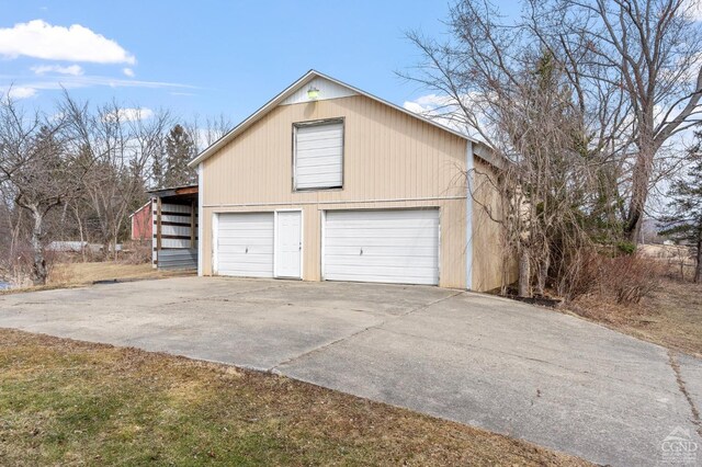 garage featuring driveway