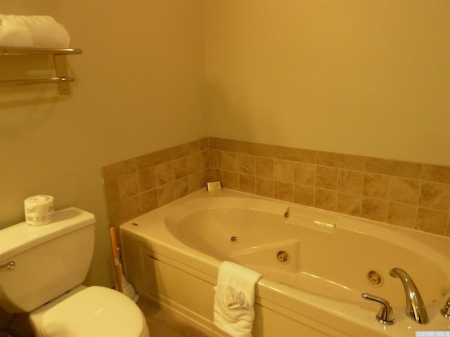 bathroom with toilet and a tub to relax in