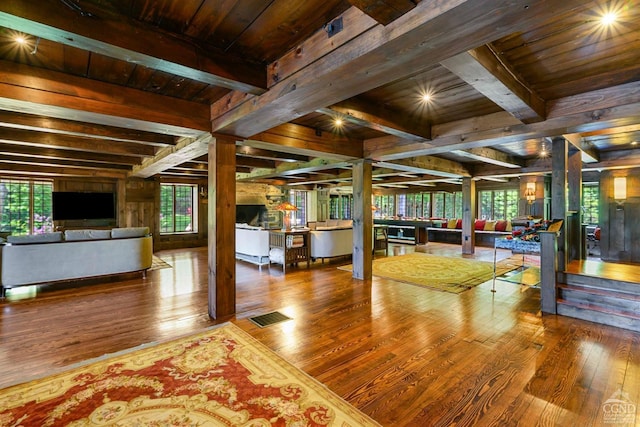 game room featuring hardwood / wood-style flooring, a healthy amount of sunlight, and wood ceiling