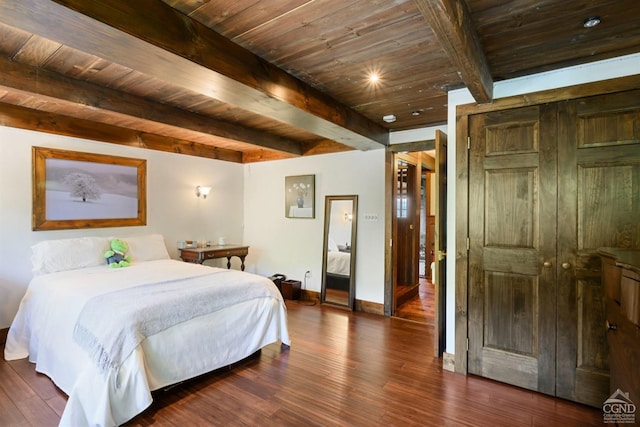 bedroom featuring dark hardwood / wood-style flooring, beamed ceiling, and wood ceiling